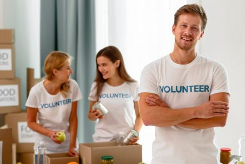 volunteers-work-preparing-donations-charity_23-2148638025